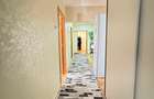 Apartament 4 camere decomandat - etaj intermediar - doua bai - doua balcoane - Dacia - Sc. G . Calinescu - 10
