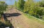 Teren intravilan 2.300 mp cu deschidere la lac, Ciofliceni - 1