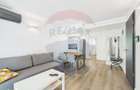 Apartament la parter ce are curte proprie , 2 camere in Bloc nou - 7