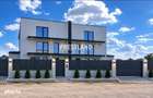 Casa pretabila pentru 2 familii cu teren 434 mp.