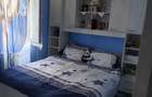 Vand apartament mobilat.