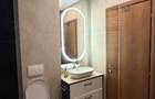 Apartament 3 camere, 2 dormitoare, 2 băi, terasă 50 mp