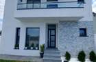 Casă cu Teren 301 Mp în Est - 1