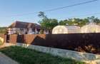 Casă cu 2 camere cu Teren 1400 Mp în Central - 1