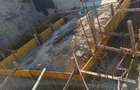 Vand teren intravilan cu constructie partiala garaj