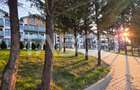 Apartamente cu curte - perfect: camin in inima naturii sau investitie