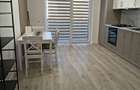 Apartament modern cu 2 camere si loc de parcare de inchiriat
