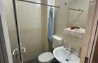 De vanzare apartament cu 2 camere si 2 bai, liber, pe Blv. Roman Musat - 2