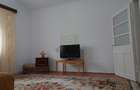 Casă individuală cu demisol + parter • 130 mp utili • Curte 237 mp • Garaj - 18