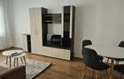 Inchiriez apartament 2 camere ,decomandat,etajul1 din 8,mobilat si utilat,aer conditionat - 1