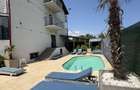 Cazare Apartamente in VILA CU PISCINA - 8