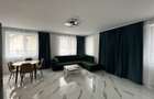 Apartament 2 camere, 57 mp + curte privata 21 mp, loc parcare inclus - 1