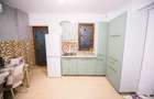 APARTAMENT cu 2 CAMERE Si CURTE PRIVATA