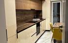 DE INCHIRIAT Apartament cu 3 camere nou,decomandat cu parcare inclusa - 1