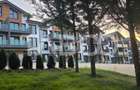 Apartamente cu curte - perfect: camin in inima naturii sau investitie