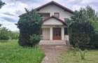 Casa P+M construita intr-o oaza de verdeata , departe de zgomotul orasului - 8