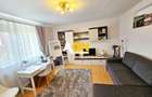 Casa 4 camere, 2 bai, 2 bucatarii, 1050 mp teren, zona Centru