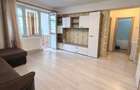 Inchiriez apartament cu doua camere zona centru complet mobilat si utilat