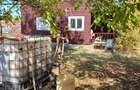 Casa de lemn + teren 2950 m2, sub 5km de centrul Tg.Mures