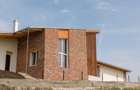 Casa semifinisata, cu totul diferita, in varf de deal, de vanzare