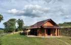 Cabana din bușteni - refugiu ideal în mijlocul naturii - 1