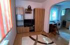 Apartament cu 2 camere, etajul 1/4, zona Podu Ros