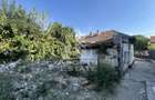 Teren intravilan 679 mp si casa demolabila, zona Crisan - 1