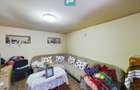 Casa cu 2 camere si 456 mp teren in Ghioroc