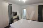 Apartament modern cu 2 camere, curte privată și 2 locuri de parcare