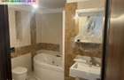 Apartament 2 cam de vanzare:Ultracentral(parcare subterana),bloc nou
