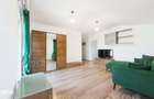 Apartament mobilat ?i utilat complet, cu curte proprie