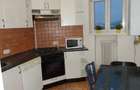 Apartament cu 4 camere, cu o suprafa?a utila de 105 m2, situat intre Pia?a Romana ?i Calea Victoriei - 1