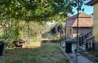 Casa cu doua corpuri,curte si gradina - 2