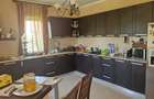 Vand casa Mandruloc constructie 2009 cu 450 mp utili pe 3.000 mp teren cu gazon si livada - 17