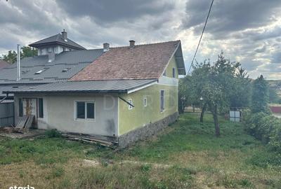 Casă cu 4 camere cu Teren 1000 Mp în Râciu