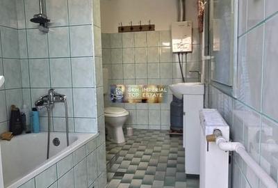 Casă cu 4 camere decomandat în Brătianu