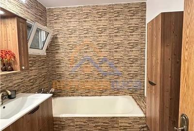 Vanzare apartament 3 camere,  bloc 1982, centrala proprie, zona Militari -  Gorj - 8