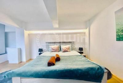 Apartament cu 18 camere semidecomandat, mobilat în Central - 2