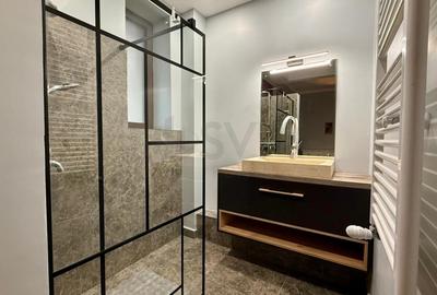 Apartament cu 5 camere semidecomandat, mobilat în Capitale - 12