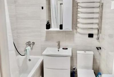 Garsonieră decomandată în Titan