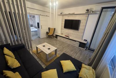 Apartament cu 2 camere semidecomandat, mobilat în Central