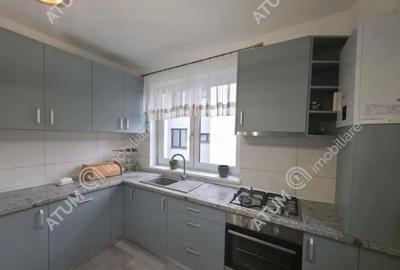 Garsonieră decomandată în Cristian - 9