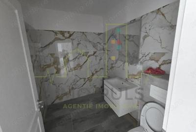 Apartament la parter cu balcon. Bucatarie separata. Loc de parcare - 1