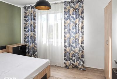 Apartament cu 2 camere semidecomandat, mobilat în Podu Roș