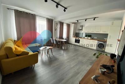 Apartament cu 2 camere semidecomandat, mobilat în Borhanci
