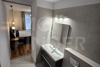 Apartament cu 3 camere semidecomandat în Borhanci