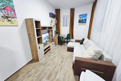 Apartament cu 2 camere semidecomandat, mobilat în P-ța Unirii