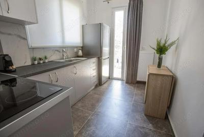 Apartament cu 2 camere decomandat în Tractorul