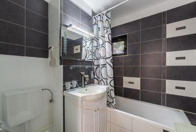 Apartament cu 3 camere semidecomandat, mobilat în Calea București - 6