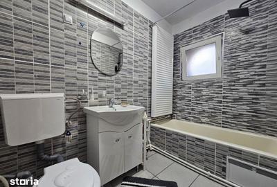Apartament cu 3 camere semidecomandat, mobilat în Universitate